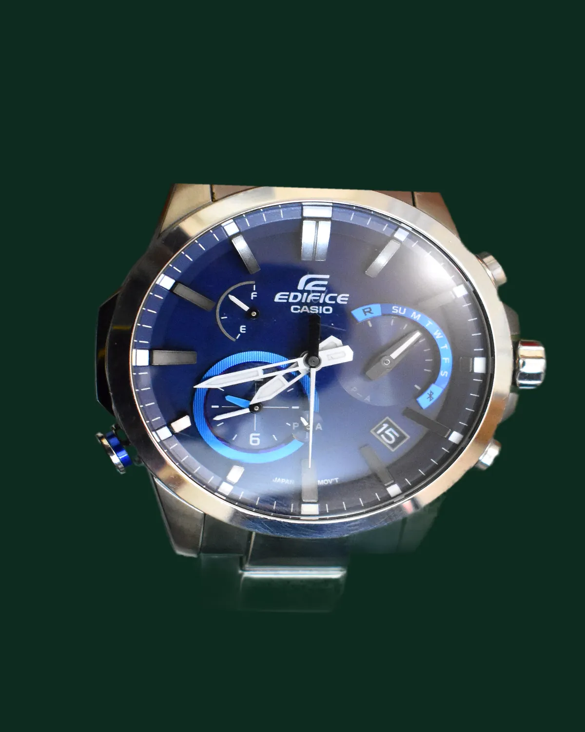 A chronograph with a blue dial and a steel bracelet