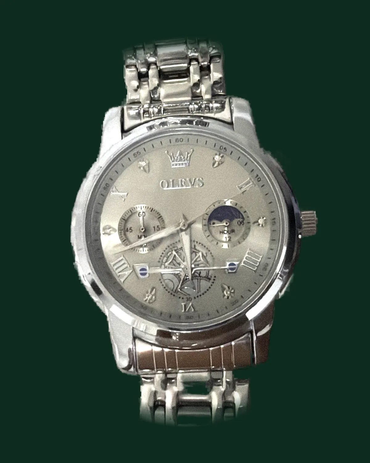 A dress watch with a white dial and a steel bracelet