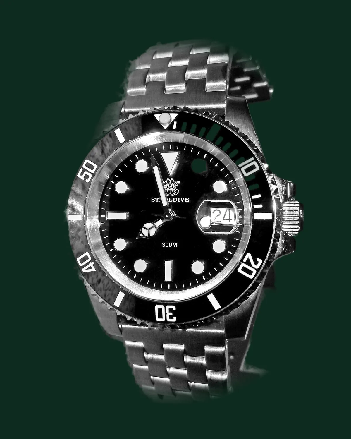 A dive watch with a black dial and a steel bracelet
